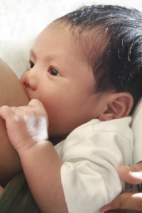 baby drinking breast milk