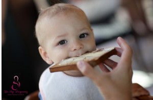 baby eating toast