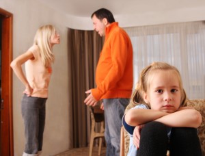 parents arguing in front of child