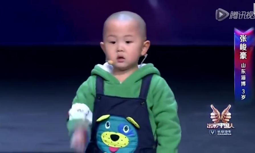 toddler performing on stage