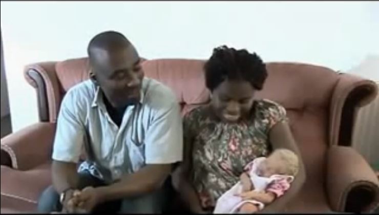 A black couple delivers to a white baby